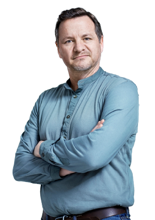 A man in a blue shirt and crossed arms.